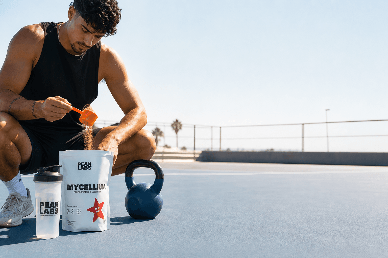 Athlete preparing PEAK LABS mycelium powder on a sunny court
